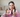 Holistic Goddess Founder holding Frankincense & Castor Oil Roller and dropper