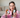Holistic Goddess Founder holding Frankincense & Castor Oil Roller and dropper