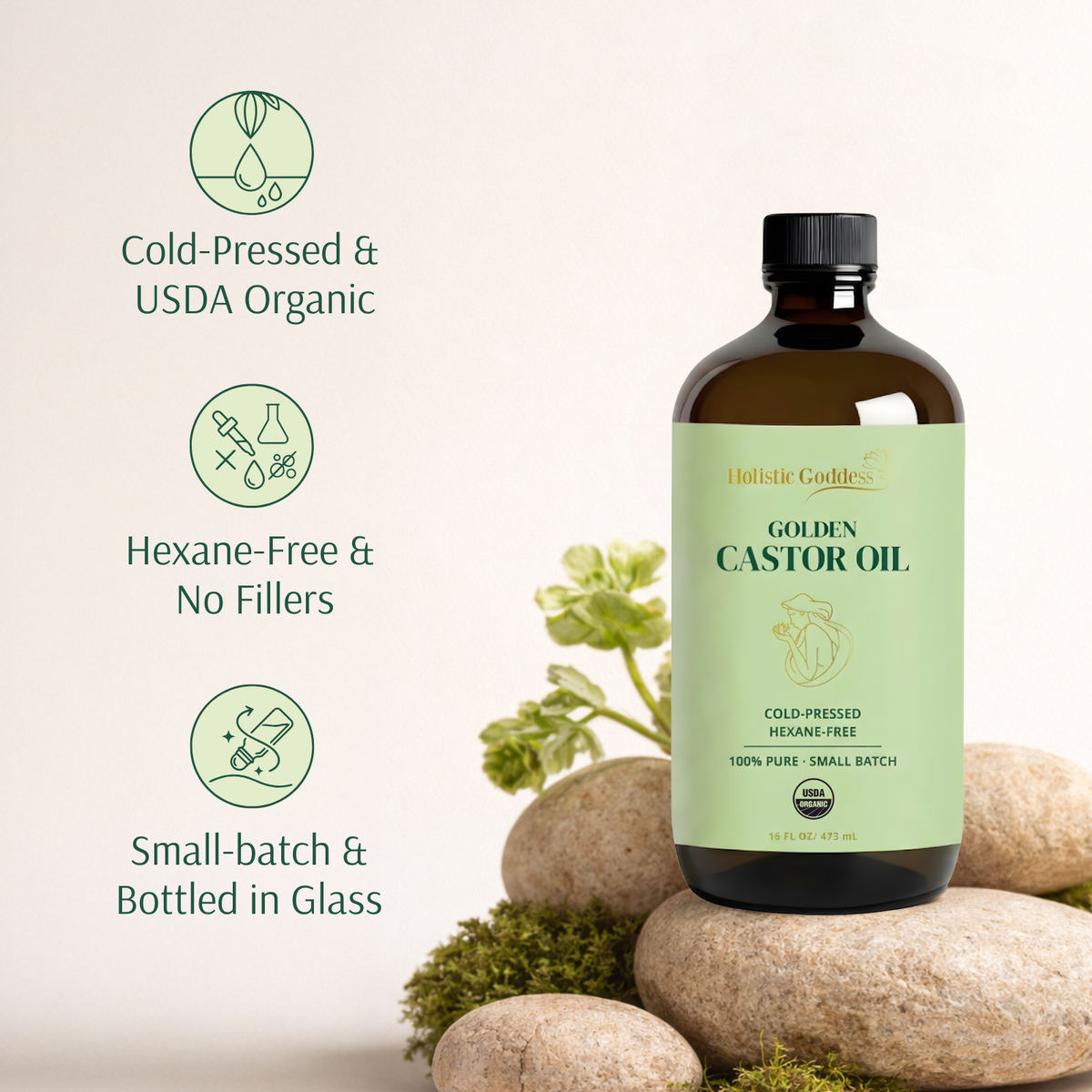 Golden Castor Oil bottle on stones with icons: cold-pressed, USDA Organic, hexane-free, no fillers, small-batch glass