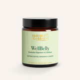 A jar of Holistic Goddess WellBelly supplement, with a label that includes the brand name and the product name, indicating it is for everyday digestion and comfort with natural enzymes, peppermint, and ginger.