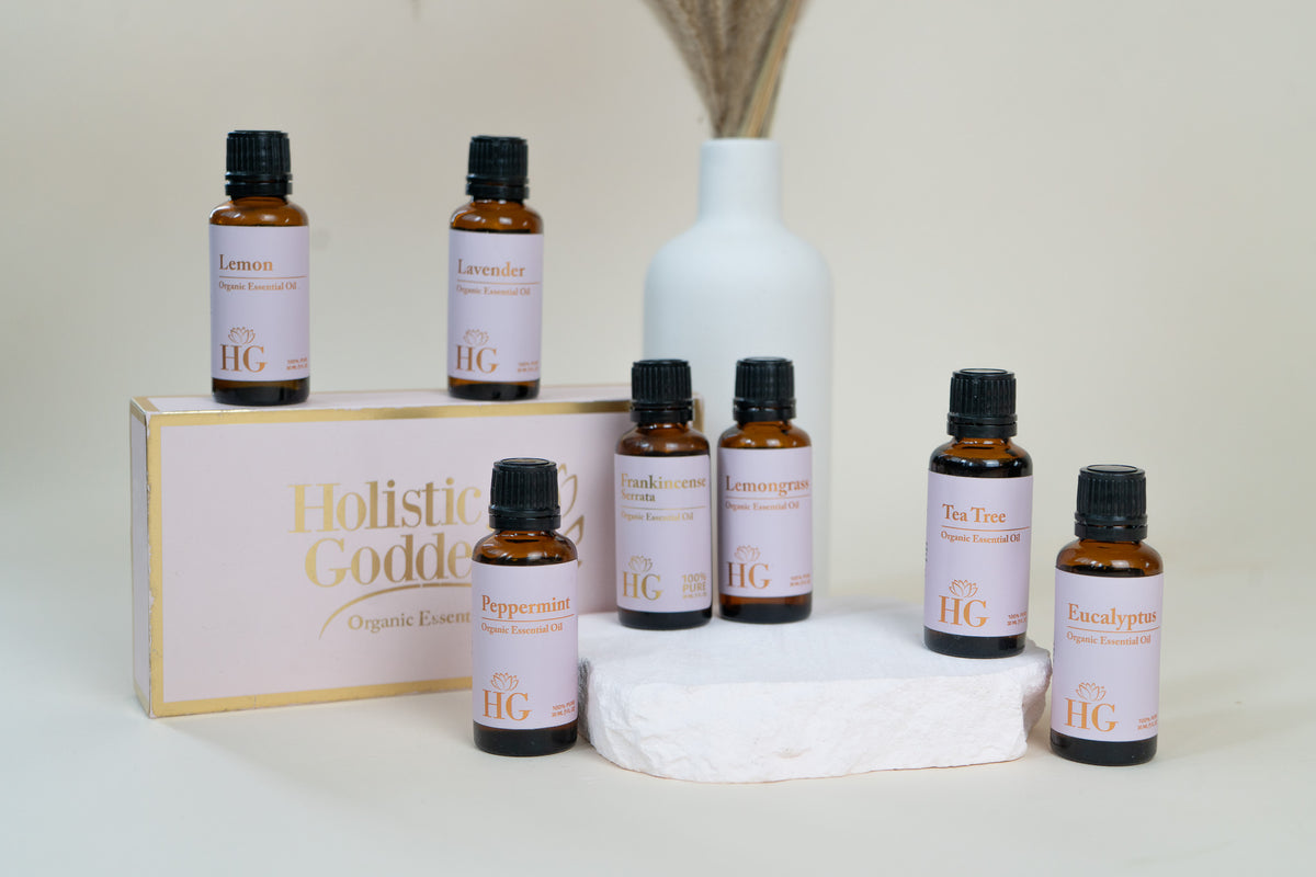 Organic Essential Oil Kit by Holistic Goddess – oil bottle lineup card with vase, lavender + lemon pairing tile