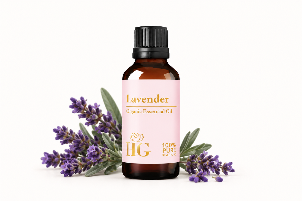 Organic Lavender Essential Oil by Holistic Goddess – bottle with lavender sprigs, empower your senses hero