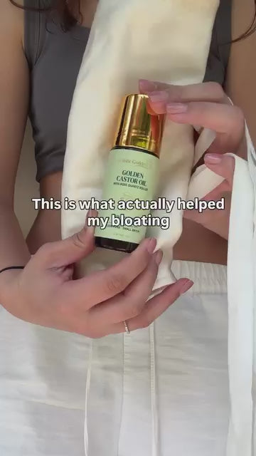 UGC video using Golden Castor Oil Roll-on with a Castor Oil pack to support bloating