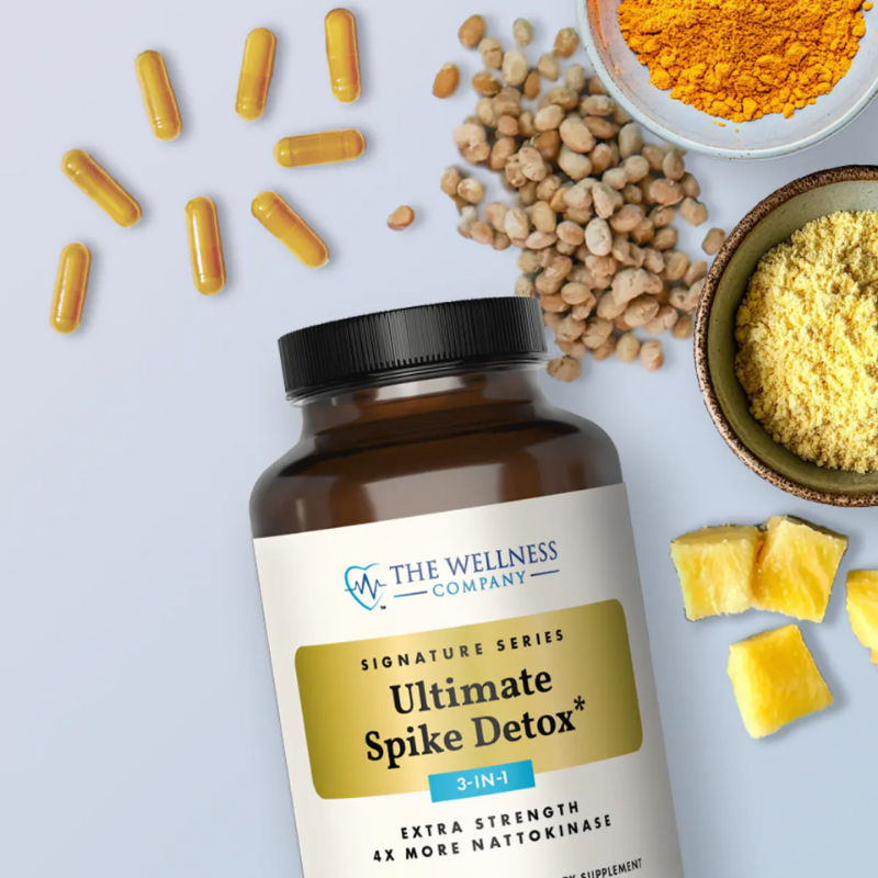Ultimate Spike Detox – bottle styled flat-lay with capsules, turmeric powder, chickpeas and pineapple chunks